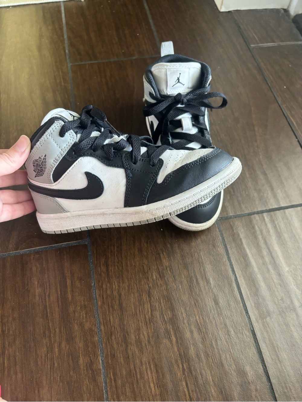 Jordan Kids Black and White Mid-Top Sneakers with Jumpman